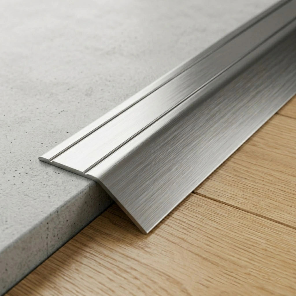 Anodised aluminium self-adhesive door threshold bar close up Inox finish