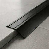 Anodised aluminium self-adhesive door threshold bar, close up, Black finish