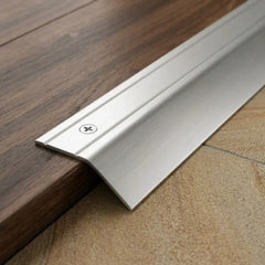 Aluminium door threshold bar screw fix anodised silver finish close up image