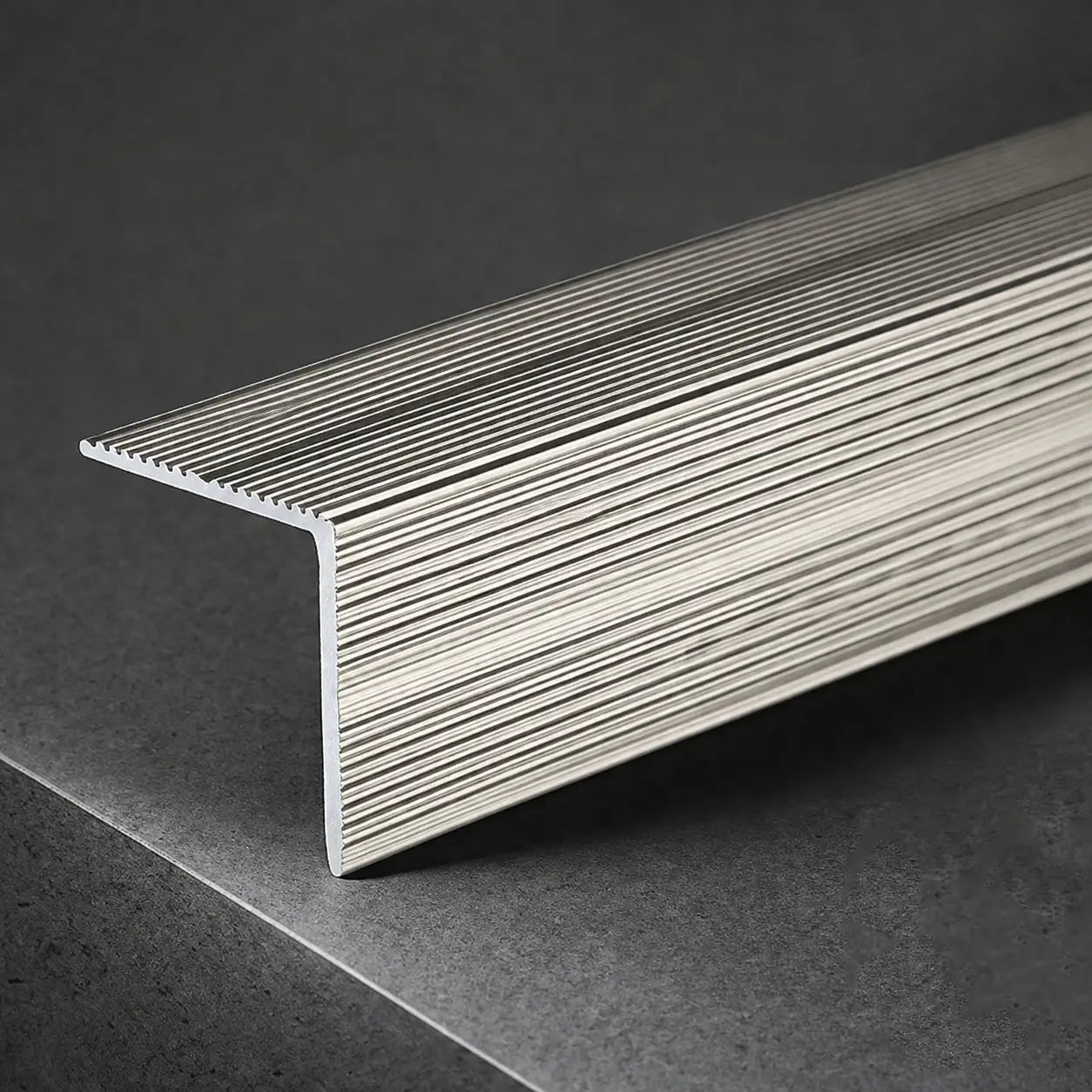 Inox anodised aluminium anti-slip stair nosing 35x35mm self-adhesive ribbed edge trim for stairs.