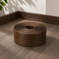 Flexible PVC trim strip wall floor edge finishing close up in brown color