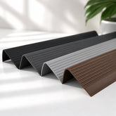 Flexible PVC anti-slip stair nosing profiles with textured grooved surface for enhanced stair edge safety and protection.