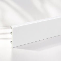 White PVC skirting board fitted in living room hallway UK