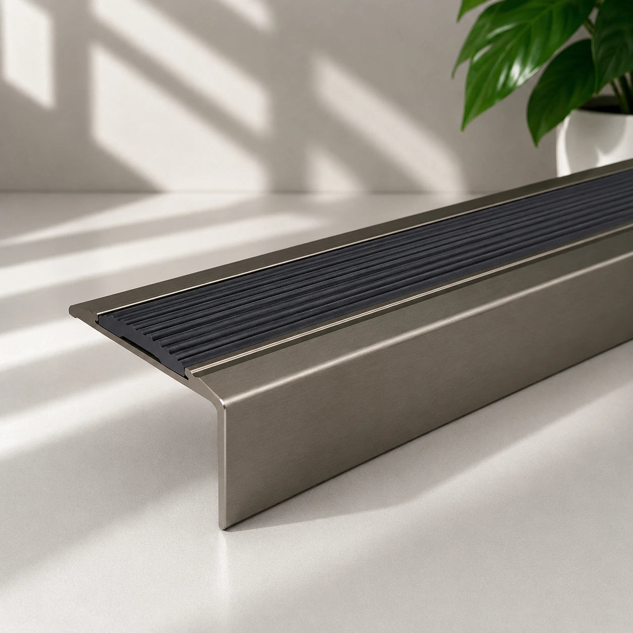 Champagne Aluminium Stair Nosing with Black Rubber Insert Screw Fix