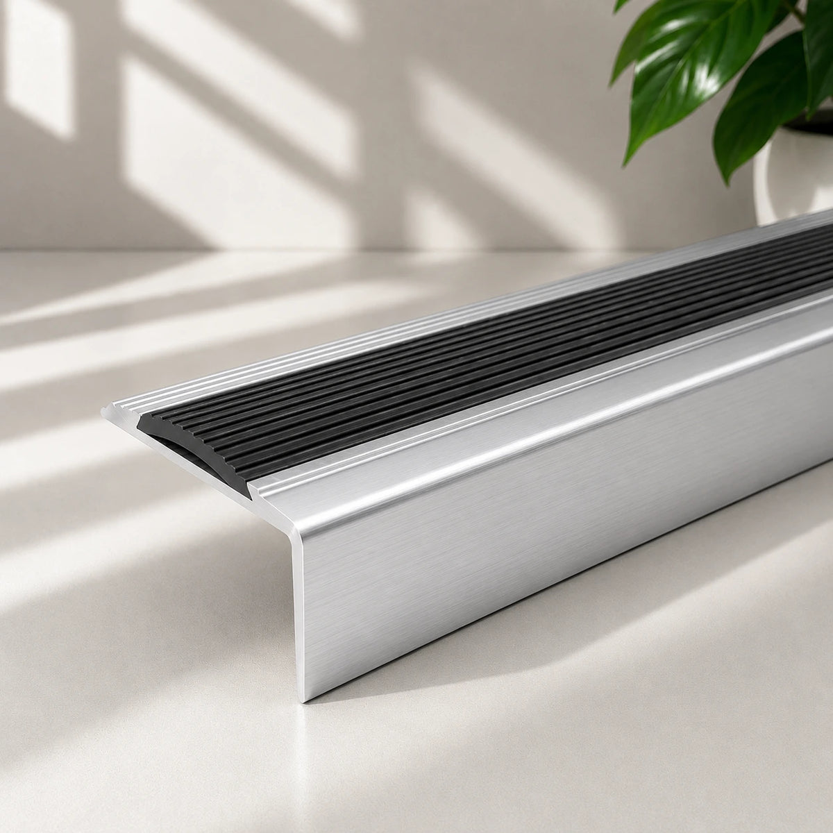 Silver Aluminium Stair Nosing with Black Rubber Insert Screw Fix